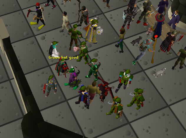 Players gathered at the Grand Exchange wearing green hats; the game chat reads Green hat good.